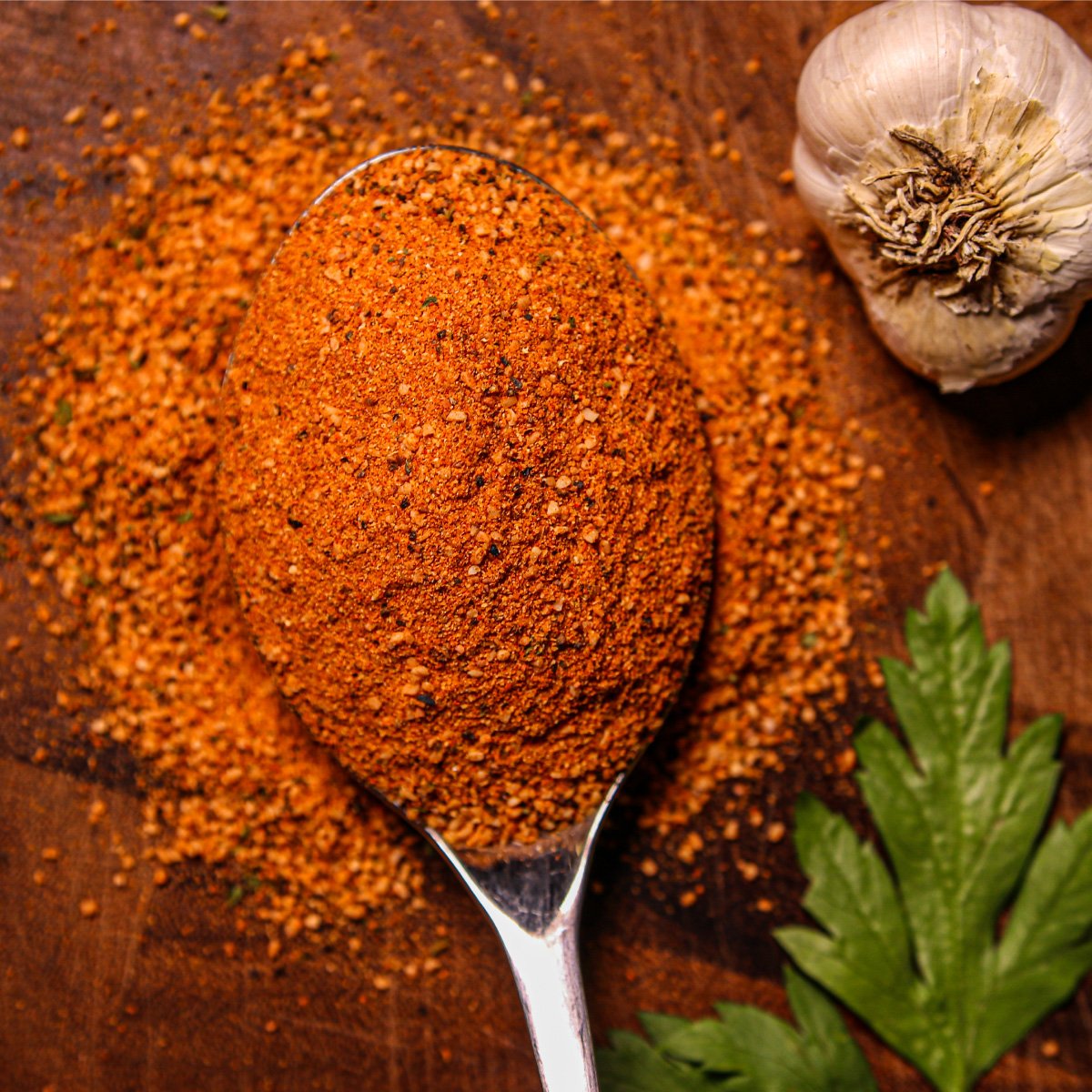 Ben's Heffer Dust on spoon showing the spice out of bottle.